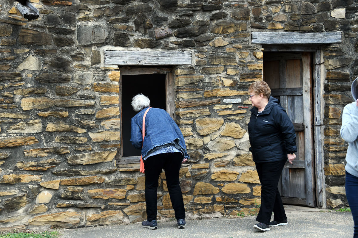 104 Joyce Dose and Jane Rhodes examine the Indian accommodations at the San Jose mission.JPG